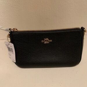Brand new Coach wristlet